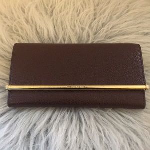 Henri Bendel wallet burgundy caviar leather